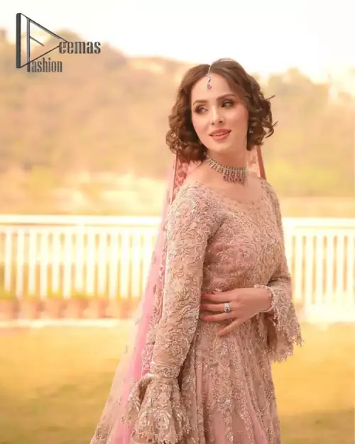 There is nothing more magical than wearing pink colour on your Walima. Our pink side slit open maxi is handsomely
