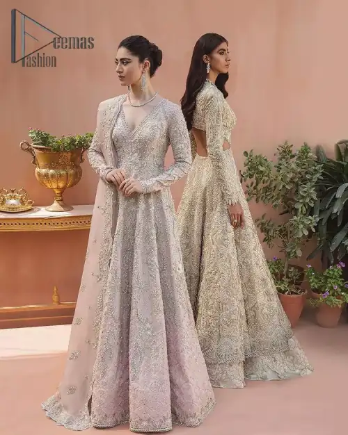 A true epitome of elegance. Confected ever so beautifully with the oyster pink colour palette and eye-catching embroidery. The ouster