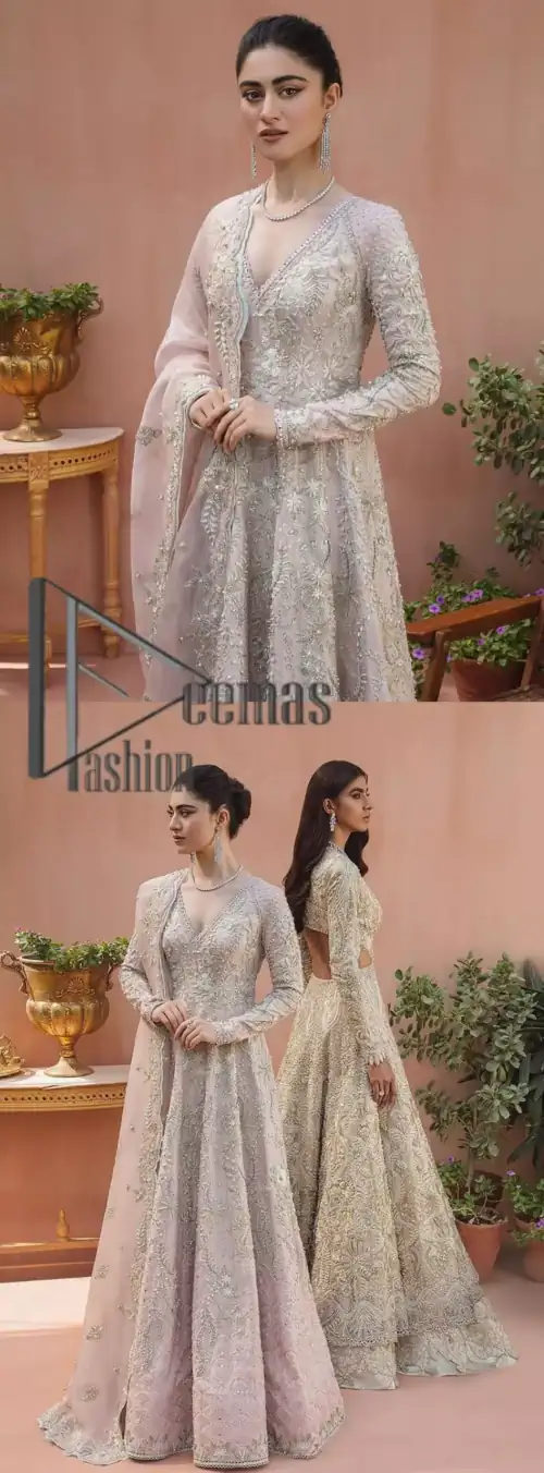 A true epitome of elegance. Confected ever so beautifully with the oyster pink colour palette and eye-catching embroidery. The ouster