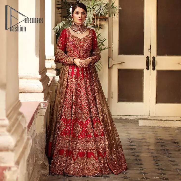 Dress up for your occasion, it's time to dance on your Big day. Give a fresh twist to your wedding Big day outfits with this eye-catching red article. Reveal your day with the red heavy blouse that is attractively adorned with golden embroidery which includes tilla, dabka, kora work so that you can embezzle everyone's attraction. In addition to this, the V shape neckline of the blouse is just soothing when comes with full sleeves. The blouse is coordinated with a red lehenga that is heavily embellished with marvelous embroidery to give you a queen look. Complete this outfit with a golden dupatta which enhanced the beauty of the outfit.