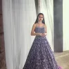 Style with an unparalleled ravishing, by picking the right dress for you. Evening parties of Walima being full of entertainment are maxed up with gratification if your dress wins you the most admirers. This sleeveless Purple Frilled Maxi has the magical features to make you an evening star. Decorated with silver embroidery, its stunning square neckline suits its highly enchanting silver embroidery. This Maxi is designed from 100% pure Organza Stuff that gives you artistic look at your event.