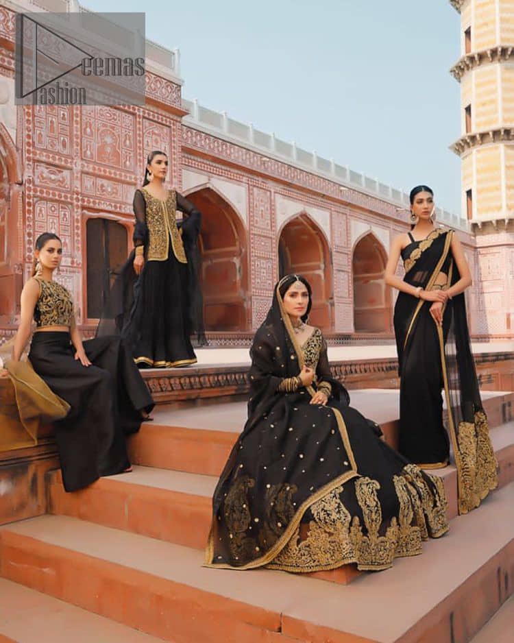 With the timeless charm of black so back on traditional flavour to steal everyone's heart. Introducing the black jacket that is the epitome of splendour with delicate details beautifully decorated with golden colour. The bodice of the jacket is enhanced with stunning embroidery with worked finishing of tilla, kora, dabka and zardozi. The addition of simple sleeves with V shape neckline can be done to make this super traditional. To complete this traditional jacket, a crushed sharara is added to give you an amazing look at any formal event. Complete this black outfit with a black dupatta in a plain style that is perfect for any intimate evening 