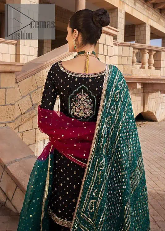 The perfect combination of crazy black with ever so classic green. Stunningly embrace you with a black shirt which is beautifully decorated with golden embroidery so you can wear it at any night and day dazzling event. It involves kora, dabka and Kundan work to escalate the beauty of the outfit. Further, the boat shape neckline amplifies the point of view when together with full sleeves. It is coordinated with black gharara that is enhanced with floral motifs all over. Finish this article with a green dupatta that is adorned with sequins sprayed all over. You can also carry a chaddar of green colour with this outfit.