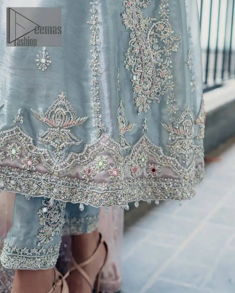Light blue just follow the pattern of sky to make everyone selenophile. DeemasFashion presents this article in the light blue colour rendered with silver embroidery which includes cystal, tilla, dabka and mainly crystals to give you a dreamy fairy look. The square neckline of the frock added super beauty to the outfit when comes with full sleeves. Furthermore, it is paired up with straight pant whuch is adorned with silver border embroidery. End up this article with dupatta in the same colour having a four-sided embellished border and sequins sprayed all over to follow the pattern of sky.