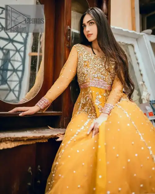 Mustard is just associated and boosts your Mehandi.  Presenting a dreamy mustard frock with a heavily embroidered bodice on a