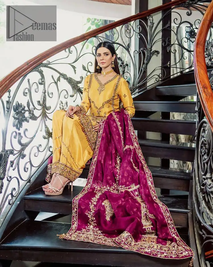 Yellow has the ability to take all the attention. Deemasfashion presents a yellow and pink outfit for your Mehandi. Starting this article with a yellow shirt that is handsomely decorated with golden embroidery and prominent with tilla, dabka, kora and zardozi to make your look super unique and perfect. Further, the following shirt is paired up with yellow straight trousers whose border is again rendered with golden embroidery. Complete this article with a magenta dupatta embellished with intimate border embroidery to gain all the attention of the event.