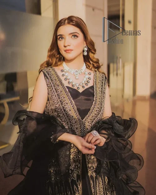 Wear black in-depth to lead colourful lives. DeemasFashion presents black party wear which includes a front open maxi having light