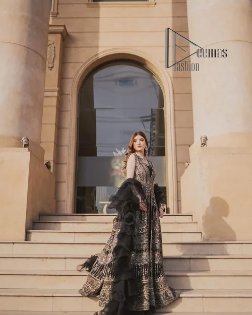 Wear black in-depth to lead colourful lives. DeemasFashion presents black party wear which includes a front open maxi having light