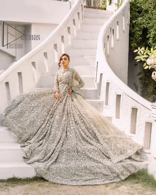 It was love at first swipe! Presenting this olive green back train maxi which is laboriously hand-rendered with silver and