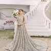 It was love at first swipe! Presenting this olive green back train maxi which is laboriously hand-rendered with silver and matching embroidery to make you a pure soulful bride. It is enhanced with tilla, dabka, kora and Kundan. The illusion neckline adds more beauty to this walima wear when comes with full sleeves. The back train flare is made just for you to catch more and more love from your loved ones. Complete this walima wear with a dupatta in the same colour which is handsomely embellished with a four-sided heavy border and sequins sprayed all over to receive more love.