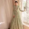 A time of life that is not just an occasion but a celebration. A pastel green scalloped maxi laboriously frosted with meticulously detailed hand embellished with silver tilla, dabka, and kora work blooming all over. Further, the jewel neckline and full sleeves of this article give so soothing feeling to you your walima day. Walima dress is handsomely coordinated with a pastel green lehenga that is again beautifully embellished. Complete this walima dress with the organza dupatta in the same colour, heavily laden with a four-sided border and tiny floral motifs all over with a magical stream of pearls.