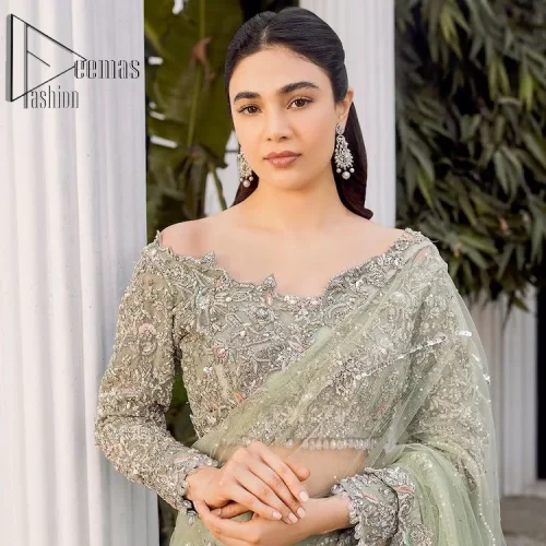 You go girl. Get you a handsome outfit that will wear matching robes. DeemasFashion presents this pistachio green saree to