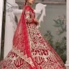 Marry someone who makes your heart shine. Wear what makes your soul shine. Introducing this Pakistani reception outfit which begins with a red blouse which is laboriously hand-rendered with silver embroidery to make your day super bright as silver colour. Further, it is highlighted with tilla, dabka, kora and crystal. The blouse of this Pakistani reception outfit is enhanced with boat shape neckline and three-quarter sleeves. The following blouse of the Pakistani reception outfit is systemized with a panelled lehenga in the same colour which is again heavily embellished. Complete this outfit with a frilled dupatta which is embellished with two-sided borders and sequins sprayed all over to make you shine.