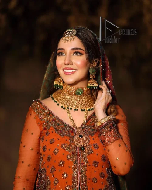 A colourful mehndi outfit is a power which directly influences the soul. Begin this mehndi outfit with a rusted front