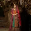 A colourful mehndi outfit is a power which directly influences the soul. Begin this mehndi outfit with a rusted front open shirt which is beautifully decorated with colourful embroidery to give you more power on your mehndi day. It is prominent with tilla, dabka, kora and zardozi. Further, the V shape neckline adds to this mehndi outfit when comes with full sleeves. Paired with a green lehenga having multiple colour borders to give you a more traditional look also. Complete this mehndi outfit with a colourful dupatta which is adorned with four-sided borders and sequins sprayed all over.