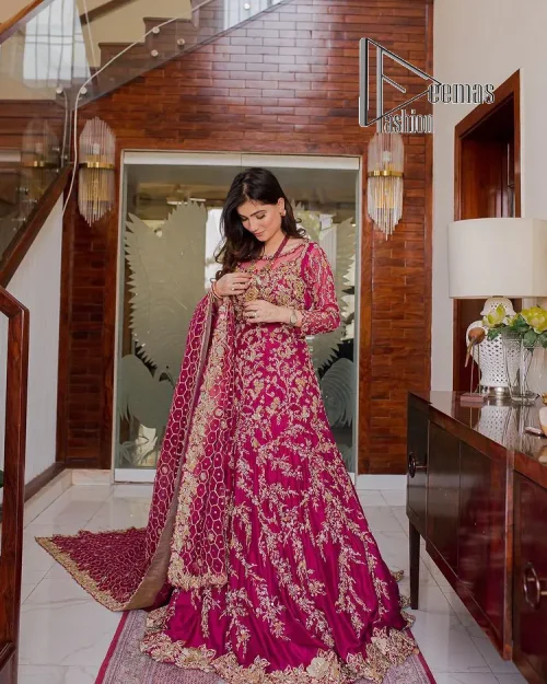 Stripes are the new pinky vibes. Introducing the Pakistani walima dress in the shade of shocking pink. This easy-breezy, romantic