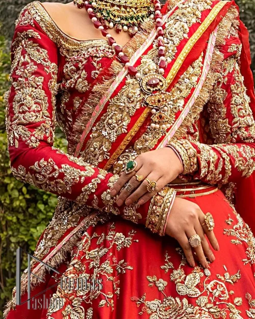 Nothing beats the luxury of bright red couture in reception. Our luxury bright red blouse is entirely hand-worked and finished