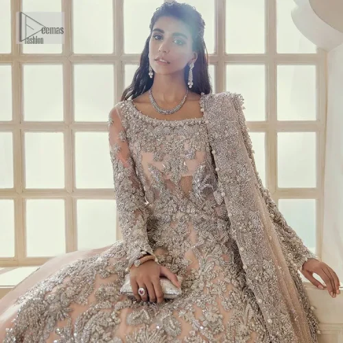 Get yourself a sweet treat, as this ensemble showcases the majestic light orange colour inscribed with lustrous embellishments. A combination