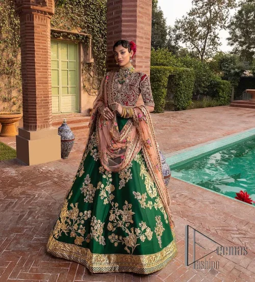 A combination of red and green are here to win hearts at your Mehndi. The attractive lehenga in green colour