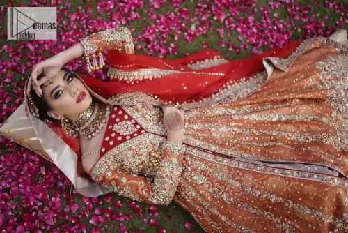 Shine bright in the sparkling ensemble from DeemasFashion. Introducing this reception outfit which begins with a rust pishwas.  This front