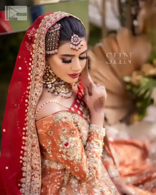 Shine bright in the sparkling ensemble from DeemasFashion. Introducing this reception outfit which begins with a rust pishwas.  This front