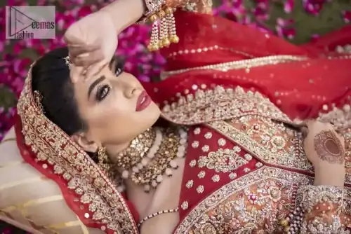 Shine bright in the sparkling ensemble from DeemasFashion. Introducing this reception outfit which begins with a rust pishwas.  This front