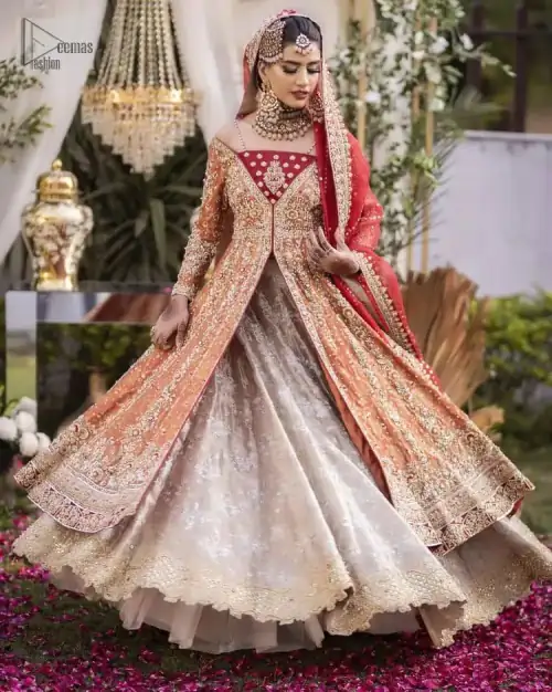 Shine bright in the sparkling ensemble from DeemasFashion. Introducing this reception outfit which begins with a rust pishwas.  This front