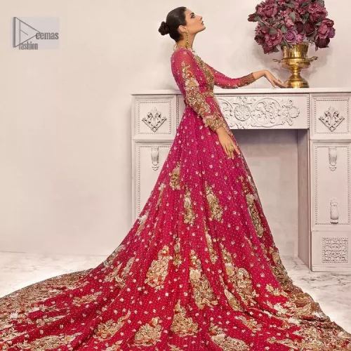 A maxi in a beautiful shade of shocking pink is deftly adorned with glowing tilla, dabka and pearls making this