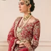 This outfit is a stand-out look for the Pakistani reception, this ensemble consists of a bright red-hued lehenga choli. This light golden embroidery is done with dense handsome work with the detailing of tilla, dabka, kora, zardozi and stone. The boat shape neckline of the following scalloped blouse intensifies the overall beauty of the outfit. Further, the beautiful floral patterns on three-quarter sleeves make this blouse super charming and ten times attractive. It is teamed up with can-can lehenga in the same colour that is ideal for the brides who want to be a queen on her Bug day. The outfit is paired with a dupatta heavily embellished all around the border, with a centre spray of sequins.