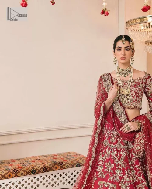 This outfit is a stand-out look for the Pakistani reception, this ensemble consists of a bright red-hued lehenga choli. This