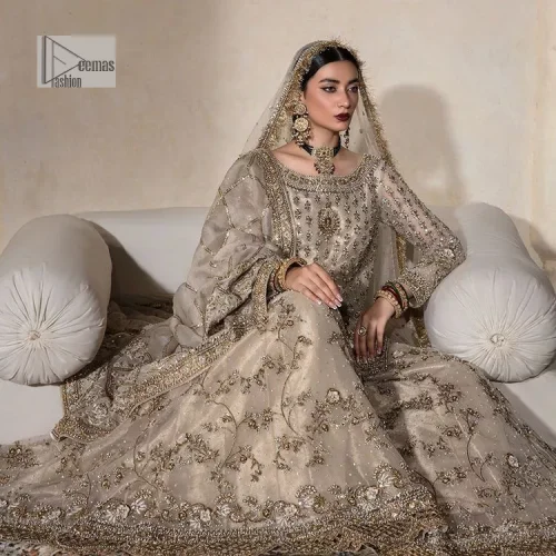 Unravel your inner density with our ivory nikah outfit. DeemasFashion presents this outfit which is embellished with light golden embroidery