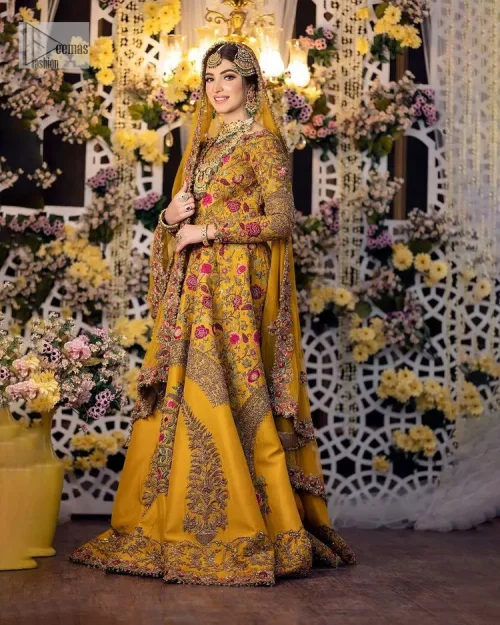 Take your style quotient up a few notches in this exquisite mehndi outfit! ]The maxi in mustard colour is a