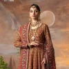 Blissful rust! This ensemble is the epitome of grace. DeemasFashion presents this beautiful mehndi outfit in rust colour to make your day super amazing. The flare maxi is attractively adorned with thread, kora, Kundan and the real magic of Zardozi. It is decorated with multiple colour embroidery to give you glam and gorgeous look. The round neckline and full sleeves are a finished way to make this masterpiece more attractive and charming. The following maxi is paired up with a dupatta in the same colour framed with a four-sided border to make the outfit graceful.