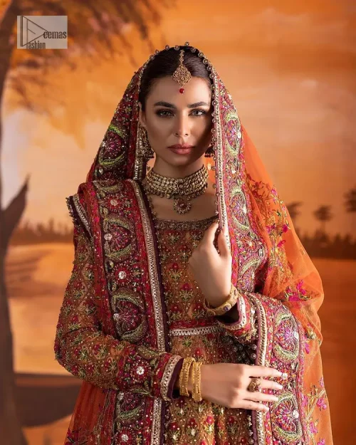 Blissful rust! This ensemble is the epitome of grace. DeemasFashion presents this beautiful mehndi outfit in rust colour to make