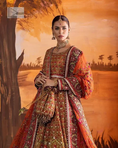 Blissful rust! This ensemble is the epitome of grace. DeemasFashion presents this beautiful mehndi outfit in rust colour to make