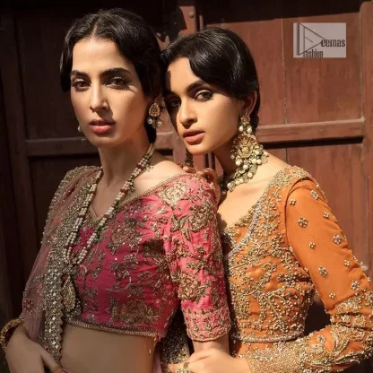 Let your dreams be your wings as your mehndi outfit. This rust heavy maxi features thoughtfully placed bold motifs all over and each motif is crafted using tilla, dabka, koran, Resham and Zardozi techniques. It is further enhanced with golden embroidery. The V shape neckline adds more beauty to the outfit when comes with embellished full sleeves. The beautiful outfit achieves the final ravishing look when paired with a delicate dupatta. The borders of this dupatta are heavily adorned with embroidery that gives a slaying touch to the whole attire.