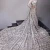 The trend of the back trains is still going strong as nikah wear - Here is the perfect one! This beautiful silver maxi is heavily embellished with silver embroidery. The gorgeous work of pearls, dabka, kora, Kundan and silver stones enhance the overall glamour of this maxi. The extraordinary design of the jewel neckline is completely embellished with silver stones and pearls embroidery combinations. The silver stones touch-up increases the looks of the beautiful gown with long tails that gives everlasting impact and at the bottom is the double flare. The full sleeves of the maxi are the lavishing style that any bride can wear on her big day.