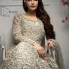 It was love at first swipe! Present this olive green back train maxi which is laboriously hand-rendered with silver embroidery to make you a pure soulful bride. It is enhanced with tilla, dabka, kora and Kundan. The illusion neckline adds more beauty to this walima wear when comes with full sleeves. The back train flare is made just for you to catch more and more love from your loved ones. Complete this walima wear with a dupatta in the same colour which is handsomely embellished with a four-sided heavy border and sequins sprayed all over to receive more love.