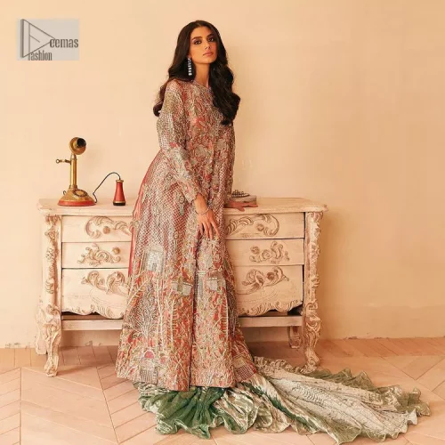 The latest elegant embroidered maxi in peach colour with magnificence embroidered work. The front open maxi is attractively laden with