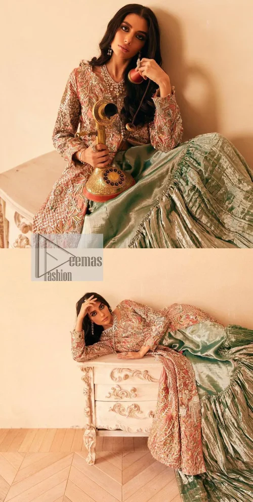 The latest elegant embroidered maxi in peach colour with magnificence embroidered work. The front open maxi is attractively laden with