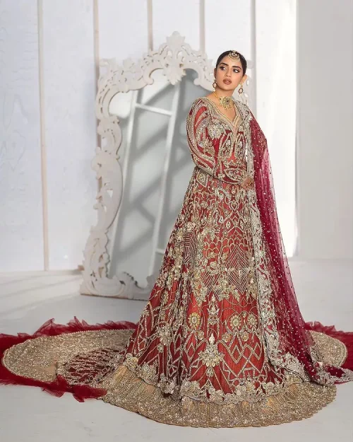 It’s all about looking stunning with a gorgeous Pakistani reception wear Red outfit. This beautiful red dress is designed with