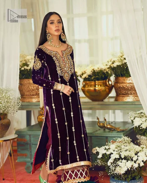 Dress yourself up in glamorous ensembles. DeemasFaashion presents this beautiful party outfit in plum colour. It is highlighted with golden