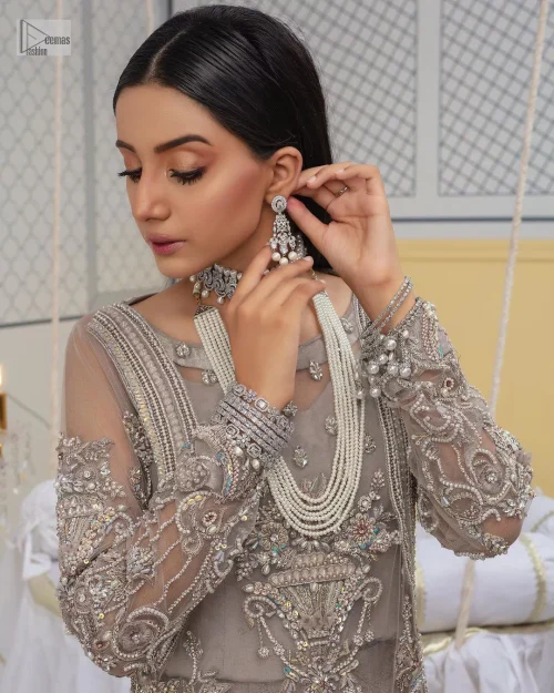 Chill vibes in grey are very rare. A beautiful grey shirt with a medley of hand-embellished floral motifs and floral