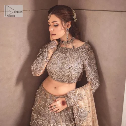 A dreamy statement of brown nikah outfit! This dress proffers a brown hue with its glamorous silver embroidery. The handsome
