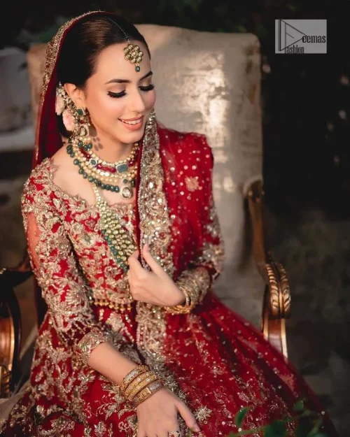 Classic deep red canvas with a bold twist of the pattern!  Bridal choli in the deep red shade is a