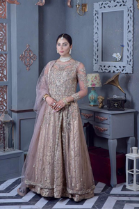 Create warm memories with this super soft and enticing tea rose nikah outfit. The vibrant shade of this maxi makes it an alluring choice for the bride. Hand-crafted adornments and designs which involve tilla, dabka, kora, Kundan and Zardozi make this attire an epitome of beauty and royalty. The round neckline of the following maxi is enhanced with silver and golden embroidery. Further, the sleeves are adorned with floral motifs to highlight the charms. The elaborately detailed border and sequin spray on the organza dupatta makes the costume ideal for your bug day.
