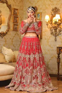When you wear this lehenga, everyone will be captivated by your beauty, making your reception a memorable event. Make a statement and showcase your individuality with this bridal style dupatta that is embellished with small motifs.