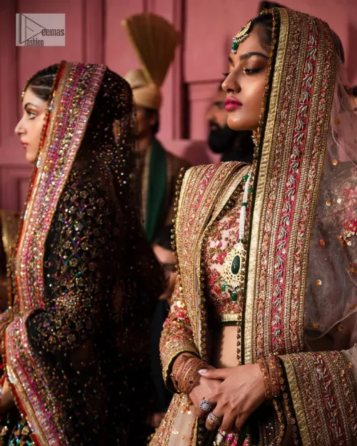 Make your superb days bright and bold! A jet black blouse with floral branches, peacock motifs and Mughal-inspired embellishments with