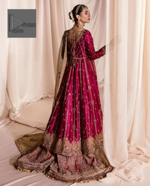 Be a dreamy vision in this reception wear. The beautiful frock in the shocking pink shade is embellished with intricate