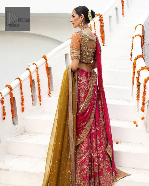 The half sleeves are decorated with silver and golden embroidery.